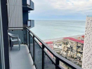 Renovated flat to sale of the new high-rise residential complex  in Batumi, Georgia. Sea View. The apartment has modern renovation and furniture. Photo 1