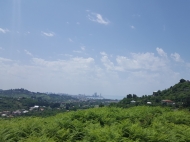 Ground area (A plot of land) for sale in a quiet district of Batumi, Georgia. Land parcel with sea view and the city. Photo 1