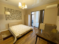 Renovated flat for sale of the new high-rise residential complex in Batumi, Georgia. The apartment has modern renovation, all necessary equipment and furniture. Photo 1