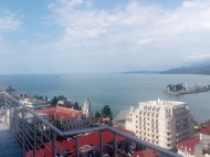 Flat to sale of the new high-rise residential complex at the seaside Batumi, Georgia. Sea View. View of the mountains and the city Photo 1