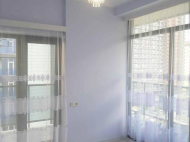 Flat for sale at the seaside Batumi, Georgia. The apartment has modern renovation and furniture. Photo 2