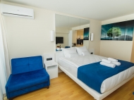 Flat for sale at the seaside Batumi. The apartment has modern renovation, all necessary equipment and furniture. Photo 2