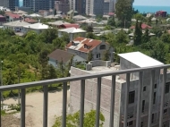In Batumi, a new black-frame apartment is for sale in a newly completed residential complex. Photo 11