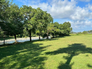 Land parcel, Ground area for sale in a resort district of Chakvi, Georgia. Near the river. Photo 1