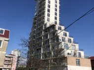 New building by the sea in Batumi. Apartments in a new residential building near the sea in Batumi, Georgia. Photo 1