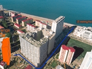 New complex of hotel type near the sea in the center of Batumi, Georgia. "Next orange". 20-storey residential complex of hotel type by the sea on Inasaridze St. in Batumi, Georgia. Photo 2