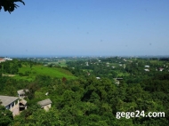 House  for sale with a plot of  land and tangerine garden in Batumi, Georgia. River view. Photo 3