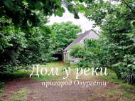 House for sale with a plot of land in Ozurgeti, Georgia. Near the river. Photo 1