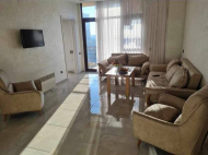 Renovated flat for sale of the new high-rise residential complex  in Batumi, Georgia. The apartment has modern renovation and furniture. Mountains view. Photo 3
