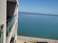 In Batumi in a new boulevard for sale apartment renovated with furniture overlooking the sea. Photo 15