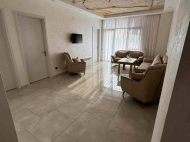 Renovated flat for sale of the new high-rise residential complex  in Batumi, Georgia. The apartment has modern renovation and furniture. Mountains view. Photo 1
