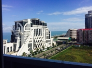Apartments by the sea in a hotel-type residential complex on New Boulevard in Batumi, Georgia. Photo 1