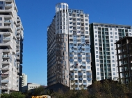 House by the sea on New boulevard in Batumi. Apartments in a new residential building by the sea on Inasaridze St., center of Batumi, Georgia. Photo 1