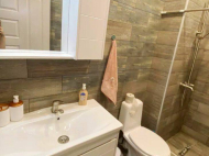 Renovated flat for sale of the new high-rise residential complex in Batumi, Georgia. The apartment has modern renovation, all necessary equipment and furniture. Photo 3