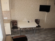 The apartment is located in the popular tourist area of ​​Batumi. In the area there are: school, pharmacies, supermarkets, restaurants, water park. 5 minutes walk from the sea. Photo 2
