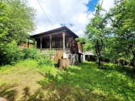 Продается частный дом с земельным участком в Цагери, Грузия. Фото 1