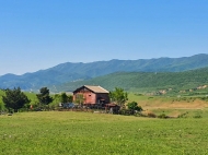 House for sale with a plot of land in the suburbs of Tbilisi, Georgia. Land parcel, Ground area for sale in a picturesque place.  Photo 1