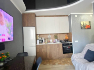 Renovated flat for sale of the new high-rise residential complex in Batumi, Georgia. The apartment has modern renovation, all necessary equipment and furniture. Photo 5