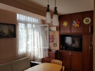 Renovated flat for sale in the centre of Batumi, Georgia. The apartment has modern renovation and furniture and fireplace. Photo 21