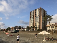 New building in the center on the seafront of Kobuleti. 11-storey new residential building by the sea on Queen Tamar St. in Kobuleti, Georgia. Photo 3