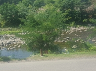 Участок у реки в Батуми. Купить земельный участок с видом на горы в Батуми, Грузия. Фото 1