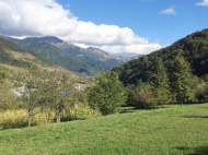 Land parcel, Ground area for sale in the resort area of Gudauri, Georgia. Near the river. Photo 1