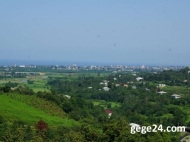 House  for sale with a plot of  land and tangerine garden in Batumi, Georgia. River view. Photo 2