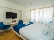 Flat for sale at the seaside Batumi. The apartment has modern renovation, all necessary equipment and furniture. Photo 1