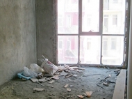 Apartment for sale in a twelve-storey new-building in the centre of Batumi. Without renovation. Photo 1