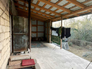 House for sale with a plot of land in the suburbs of Ozurgeti, Georgia. Orchard. Walnut garden. Natural spring. Photo 10