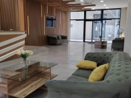 In Batumi in a new boulevard for sale apartment renovated with furniture overlooking the sea. Photo 17