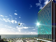 Апартаменты в ЖК гостиничного типа "ORBI Beach Tower" на берегу моря в Батуми. 34-этажный элитный жилой комплекс гостиничного типа "ORBI Beach Tower" у моря на ул.Ш.Химшиашвили в Батуми, Грузия. Фото 3