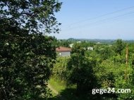 House  for sale with a plot of  land and tangerine garden in Batumi, Georgia. River view. Photo 7